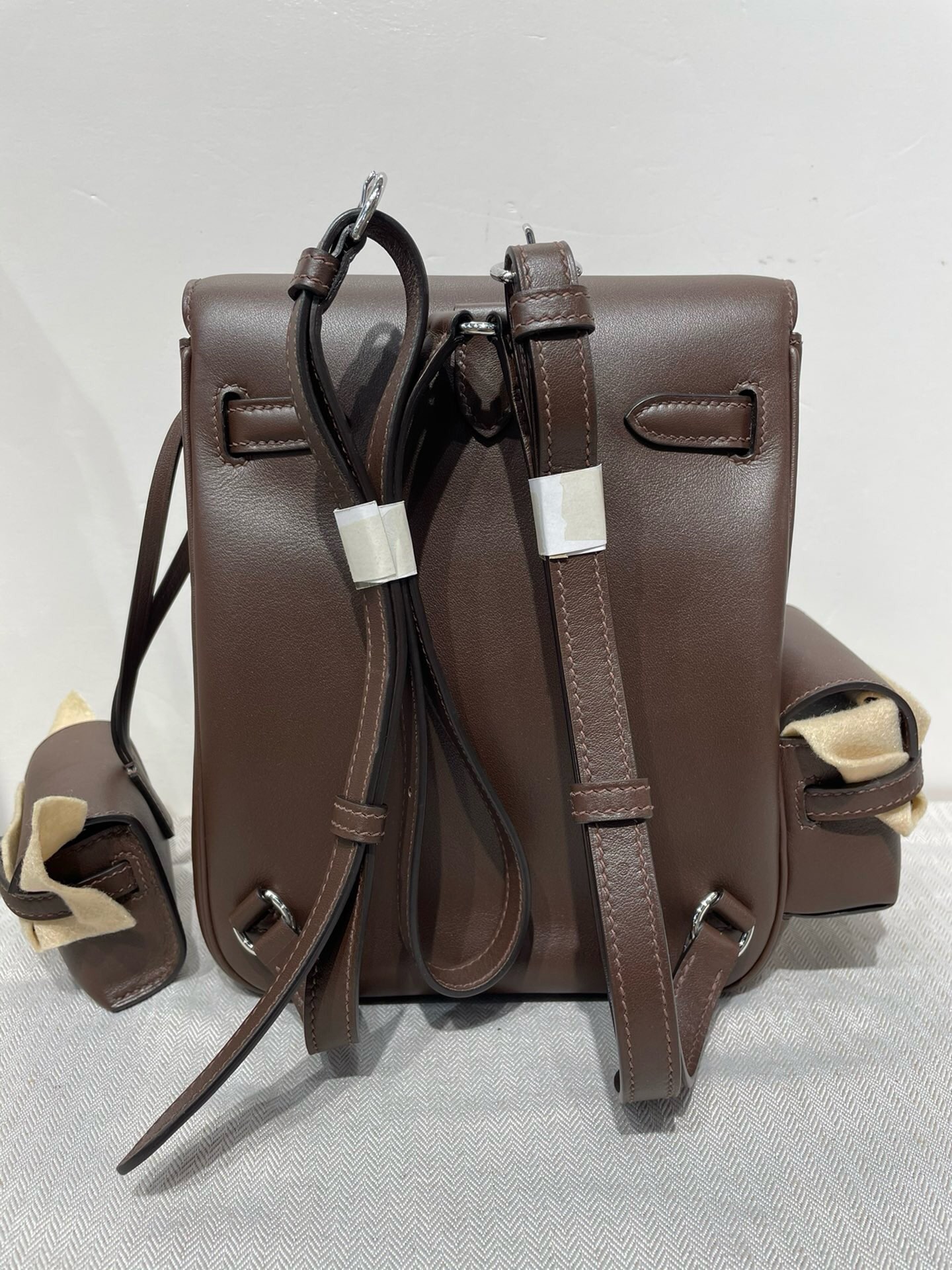 Hermes Kelly Ado Pockets Backpack In Caffee Swift Leather